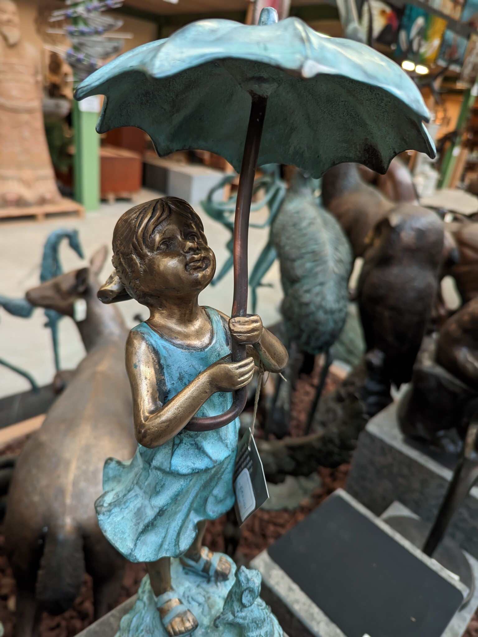 images Eliassen Beeld brons meisje onder paraplu eliassen.nl 2